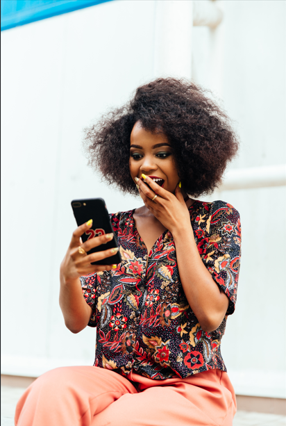 Happy customer using phone